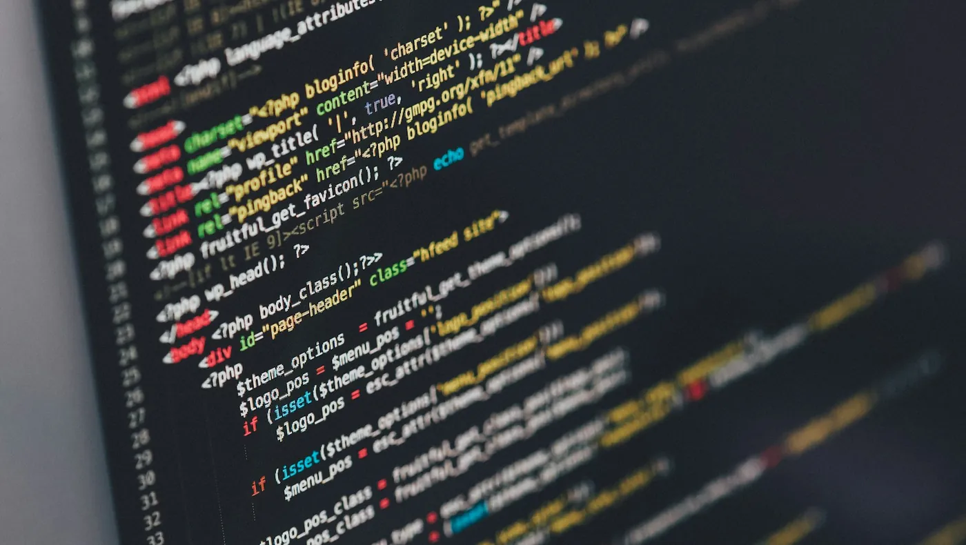 Colourful website code on a dark screen